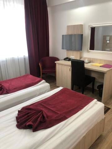 Фото номера Двухместный номер с 2 отдельными кроватями Отель Hotel Bulevard Prestige г. Слатина 7