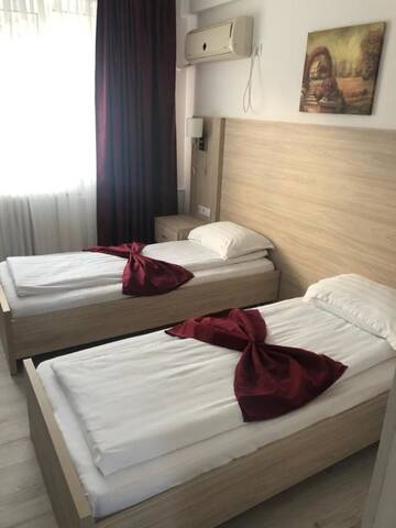 Фото номера Двухместный номер с 2 отдельными кроватями Отель Hotel Bulevard Prestige г. Слатина 6